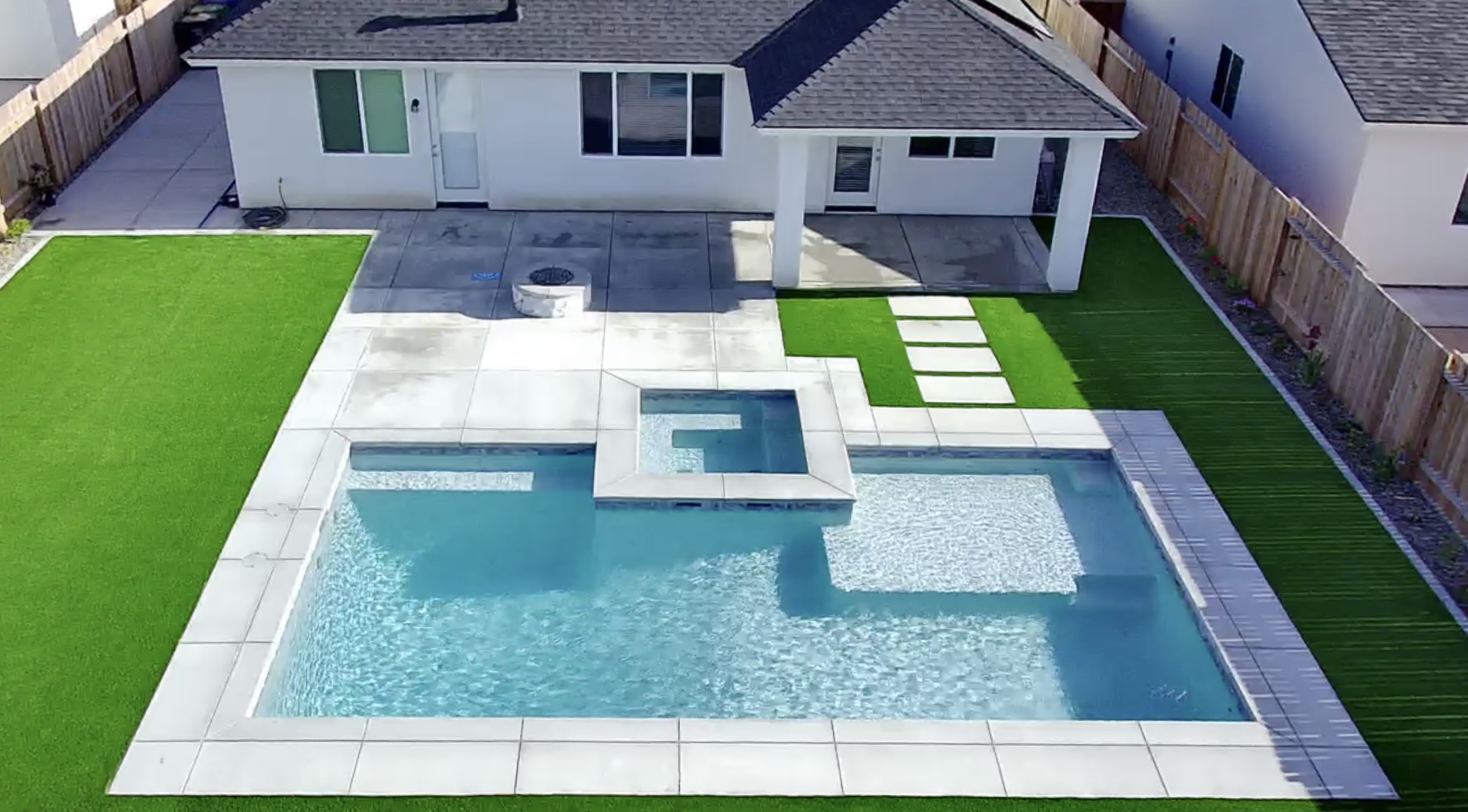 Modern pool with spa