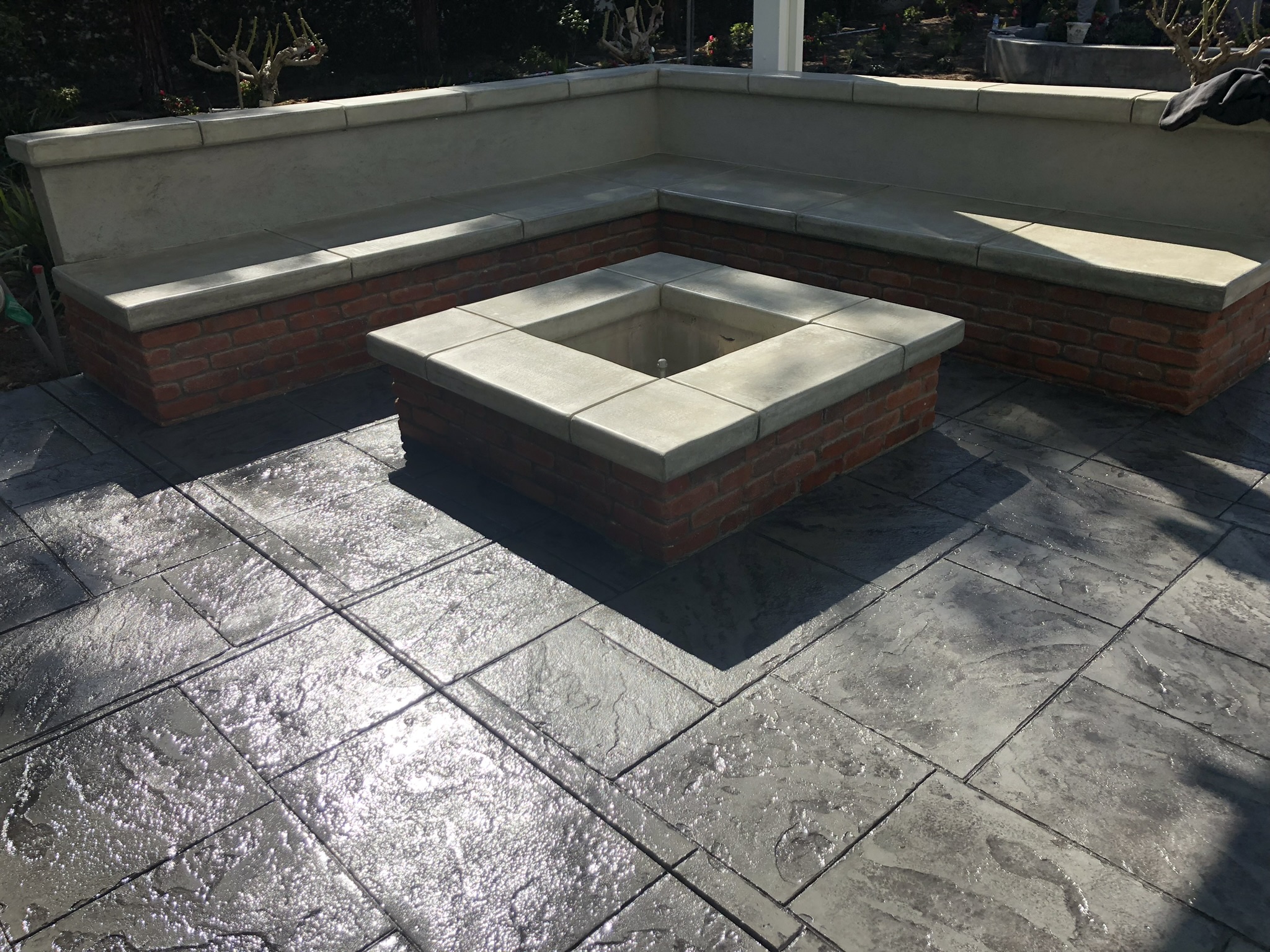 Concrete fire pit with comfortable seating arrangement